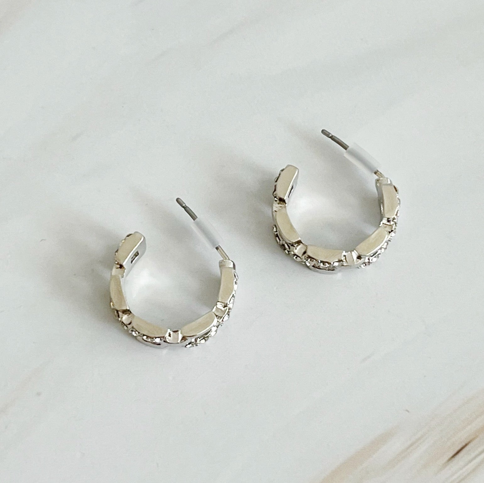Pave huggie hoops detail
