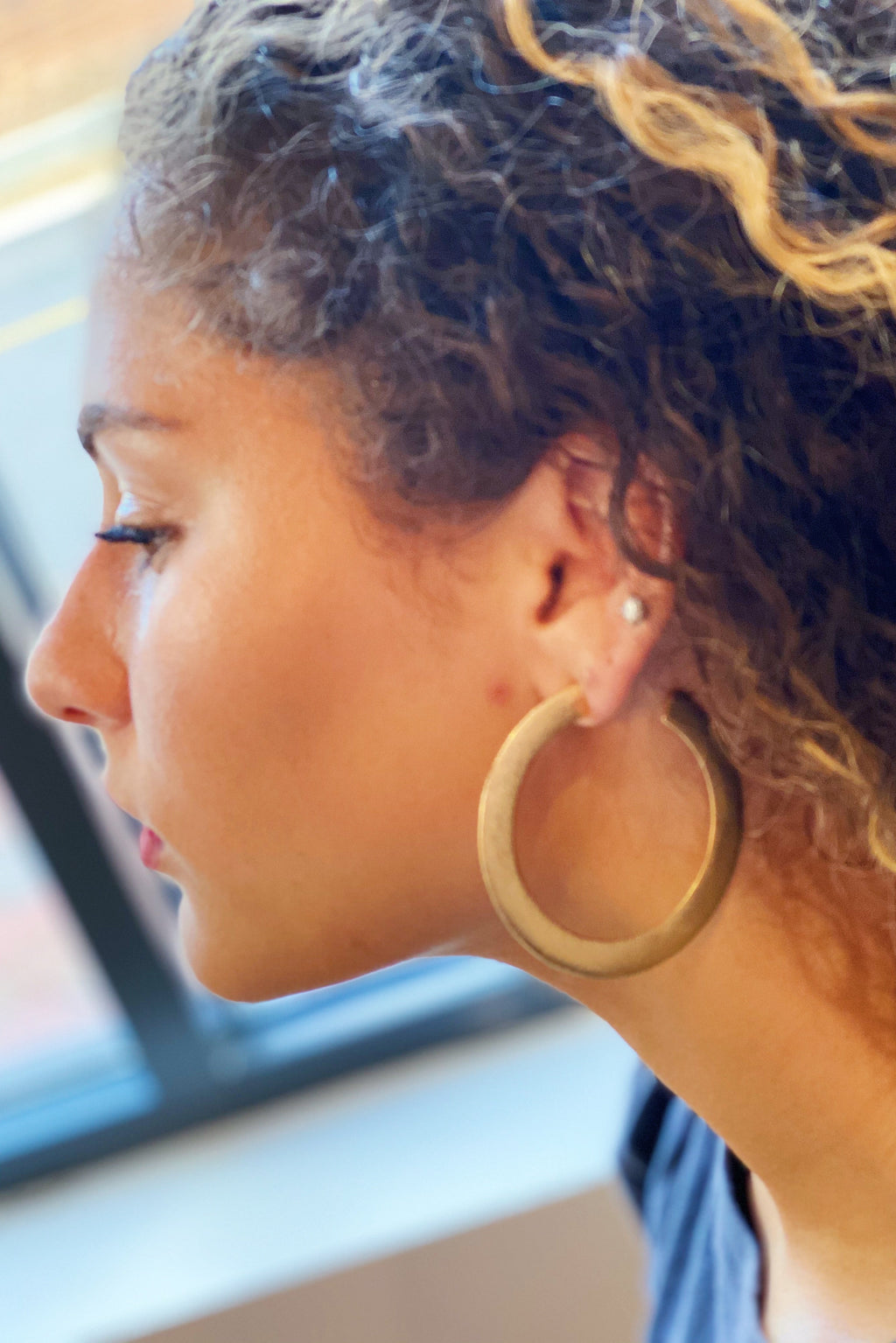 Gold hoop worn