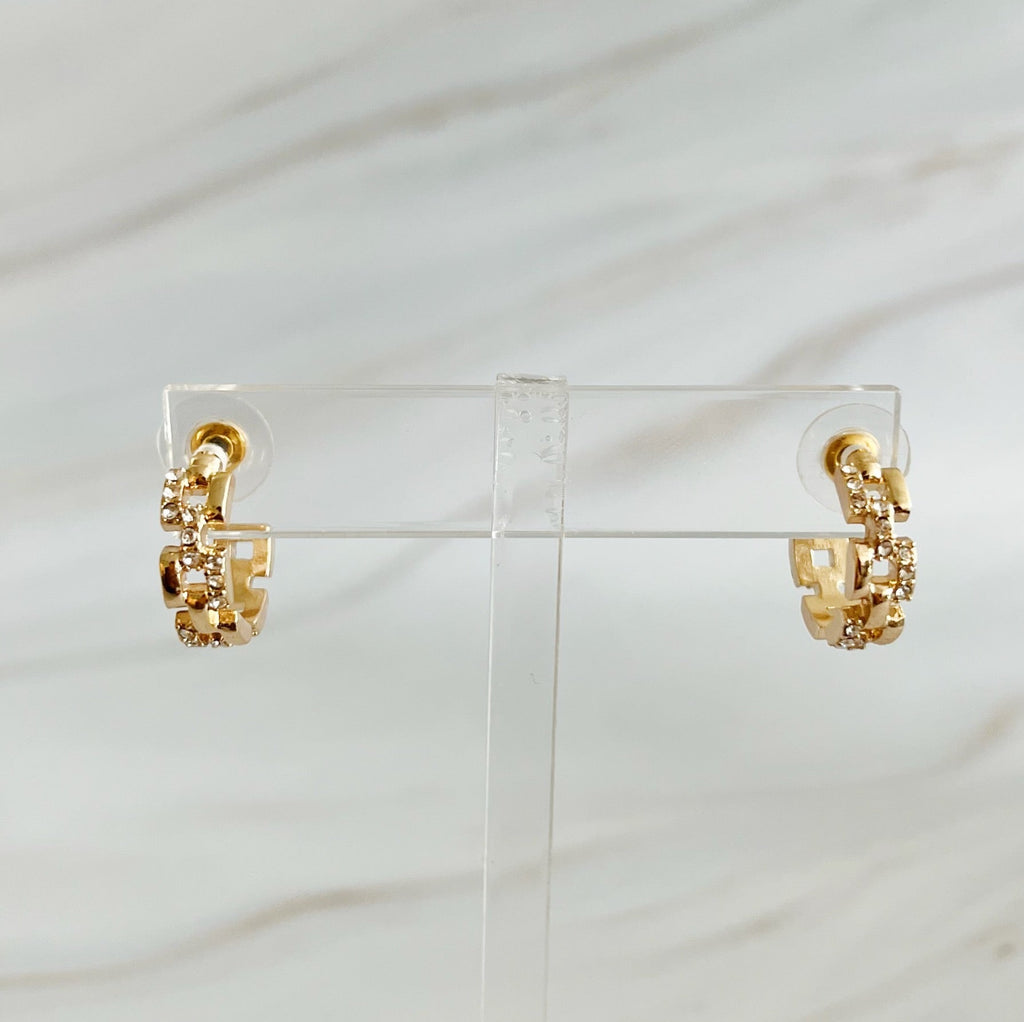 Pave huggie hoops closeup